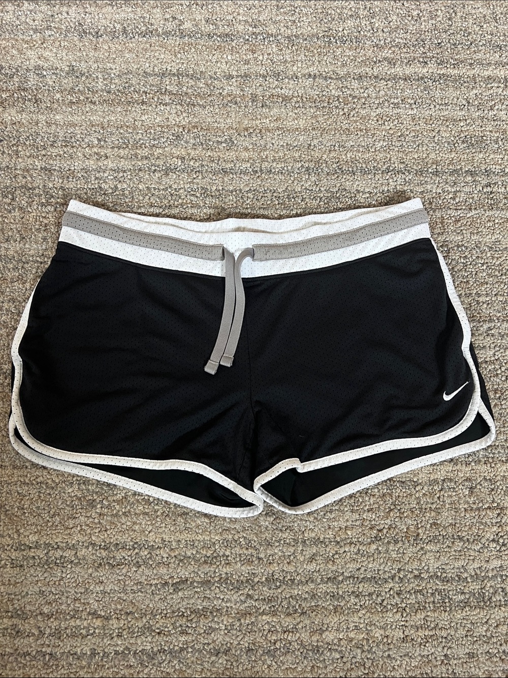 Nike Black Athletic Mesh Shorts with White Trim and Gray Waistband